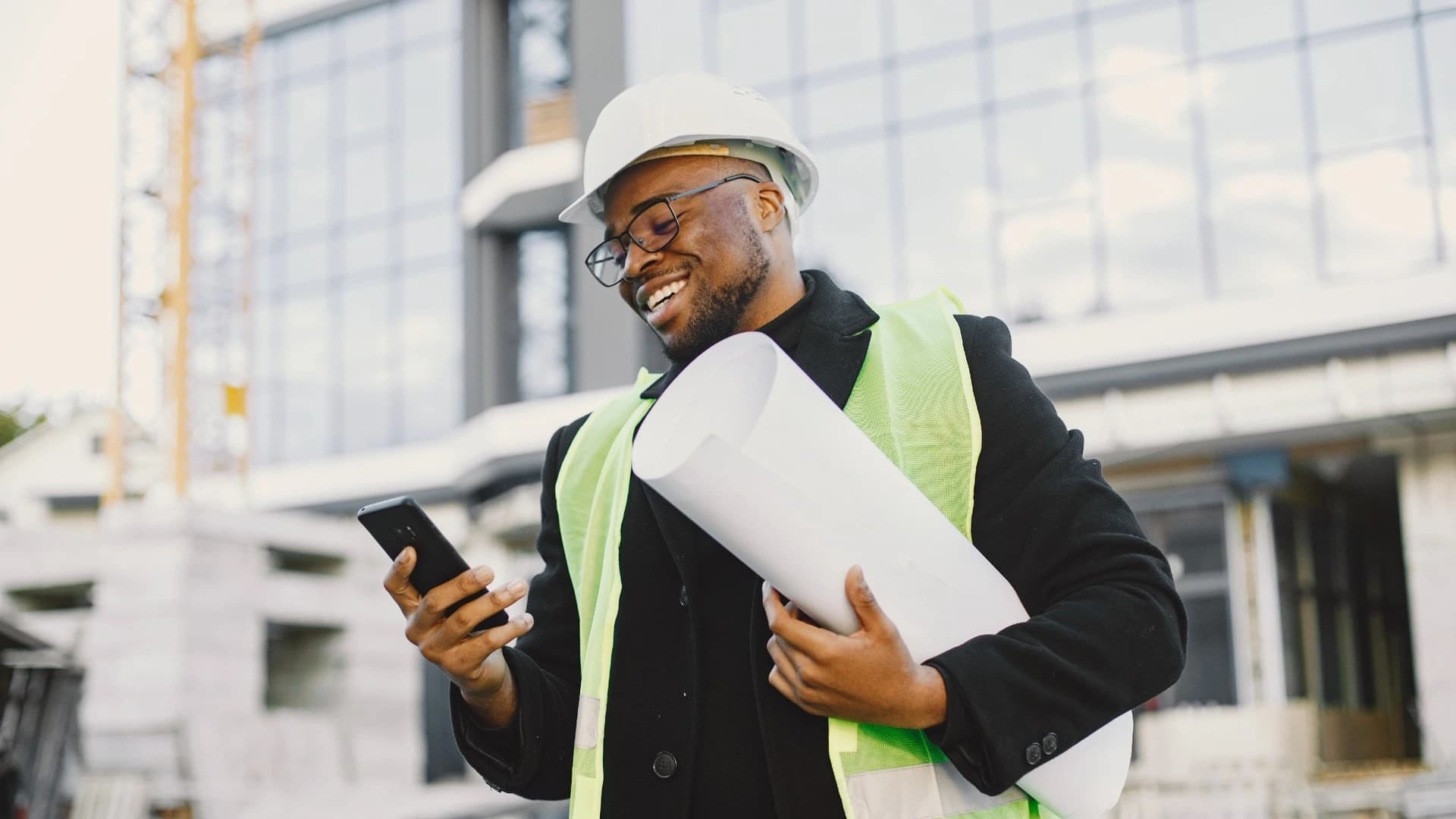 Construction professional reviewing a project site